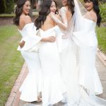 Bridesmaids' white elegant dresses